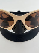 PLANTARIS OAKLEY - AREIA - PRIZM MARROM  (COMPRE UM ÓCULOS E ESCOLHA O SEGUNDO GRÁTIS)